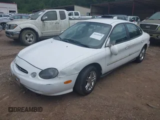 1999 Ford Taurus SE with VIN 1FAFP53U3XG245724, listed as a IAAI auction lot 42638558 with 134,764 mi miles and . Bid and sale history available at DreamBid. Image 2.