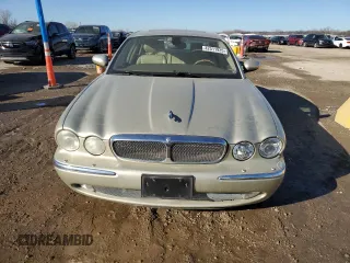 2006 Jaguar XJ with VIN SAJWA79B56SH01865, listed as a Copart auction lot 42511925 with 262,968 mi miles and Salvage Title. Bid and sale history available at carsss.com. Image 5.