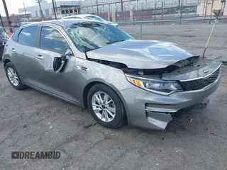2018 Kia Optima LX z VIN 5XXGT4L38JG228380, wystawiony jako IAAI lot #41960308 z przebiegiem 43 317 mil mil oraz . Historia ofert i sprzedaży dostępna na DreamBid. Obrazek 1.