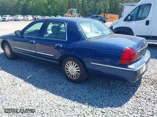 2006 Mercury Grand Marquis LS Premium with VIN 2MEFM75V36X626565, listed as a IAAI auction lot 42007096 with 164,236 mi miles. Bid and sale history available at carsss.com. Image 3.