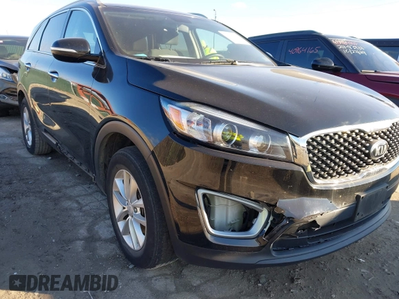2018 Kia Sorento LX z VIN 5XYPG4A39JG385905, wystawiony jako IAAI lot #40936433 z przebiegiem 116 080 mil mil oraz . Historia ofert i sprzedaży dostępna na DreamBid. Obrazek 6.