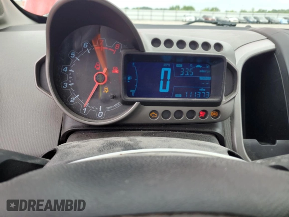 2015 Chevrolet Sonic LS with VIN 1G1JB6SH2F4156670, listed as a Copart auction lot 61572825 with 111,373 mi miles and Clean title. Bid and sale history available at DreamBid. Image 9.