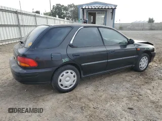 1998 Subaru Impreza L with VIN JF1GF4354WG805257, listed as a Copart auction lot 73696134 with 141,441 mi miles and Salvage title. Bid and sale history available at DreamBid. Image 3.