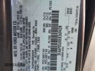 2014 Ford Fusion Titanium with VIN 3FA6P0SU0ER269439, listed as a Copart auction lot 52685265 with 150,992 mi miles and Salvage title. Bid and sale history available at DreamBid. Image 12.