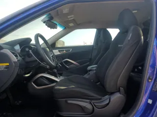 2012 Hyundai Veloster w/Red Int с VIN KMHTC6AD6CU042092, выставлен на аукционе Copart как лот 73197654 с пробегом 121 124 миль миль и Чистый • Clean title. История ставок и продаж доступна на DreamBid. Изображение 7.