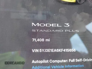 2019 Tesla Model 3 Mid Range with VIN 5YJ3E1EA6KF415656, listed as a IAAI auction lot 42140763 with 71,408 mi miles and . Bid and sale history available at carsss.com. Image 16.