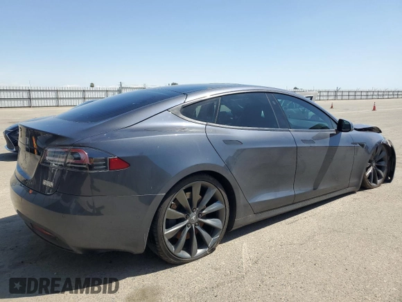 2016 Tesla Model S 90D with VIN 5YJSA1E22GF177120, listed as a Copart auction lot 51972885 with 73,441 mi miles and Salvage title. Bid and sale history available at DreamBid. Image 3.