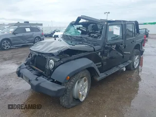 2014 Jeep Wrangler Unlimited Sport with VIN 1C4BJWDGXEL294965, listed as a IAAI auction lot 41908152 with 243,546 mi miles and . Bid and sale history available at DreamBid. Image 18.