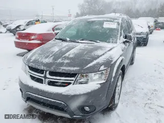 2014 Dodge Journey Limited with VIN 3C4PDCDG6ET263664, listed as a IAAI auction lot 41565629 with 55,974 mi miles. Bid and sale history available at carsss.com. Image 2.