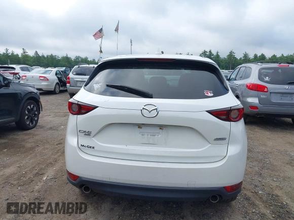 2018 Mazda CX-5 Grand Touring with VIN JM3KFBDM0J0308813, listed as a IAAI auction lot 42657978 with 78,119 mi miles and . Bid and sale history available at DreamBid. Image 17.
