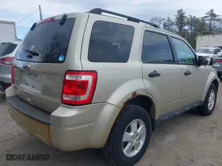 2011 Ford Escape XLT with VIN 1FMCU9D70BKA77676, listed as a IAAI auction lot 41921757 with 288,545 mi miles. Bid and sale history available at carsss.com. Image 4.