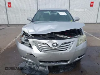 2009 Toyota Camry LE with VIN 4T1BK46K39U581157, listed as a IAAI auction lot 41827143 with 107,664 mi miles. Bid and sale history available at carsss.com. Image 6.