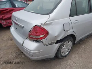 2010 Nissan Versa S with VIN 3N1BC1AP9AL404584, listed as a IAAI auction lot 42367293 with 158,377 mi miles and . Bid and sale history available at DreamBid. Image 6.