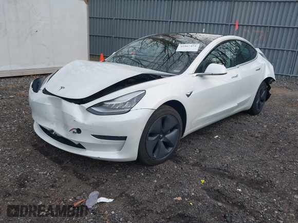 2020 Tesla Model 3 Long Range with VIN 5YJ3E1EB6LF618931, listed as a IAAI auction lot 41867451 with 47,502 mi miles and . Bid and sale history available at DreamBid. Image 2.