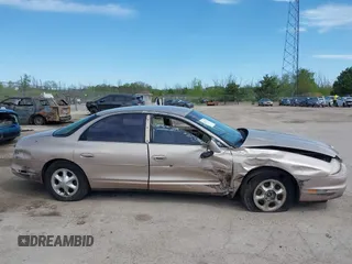 1999 Oldsmobile Aurora z VIN 1G3GR62C5X4114285, wystawiony jako IAAI lot #42271517 z przebiegiem 308 731 mil mil oraz . Historia ofert i sprzedaży dostępna na DreamBid. Obrazek 13.