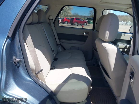 2010 Mercury Mariner with VIN 4M2CN8BG3AKJ01945, listed as a IAAI auction lot 42025848 with 124,617 mi miles. Bid and sale history available at carsss.com. Image 8.