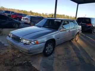 1998 Volvo S90 with VIN YV1KS9600W1125172, listed as a Copart auction lot 86560214 with 128,290 mi miles and Salvage Title. Bid and sale history available at carsss.com. Image 1.