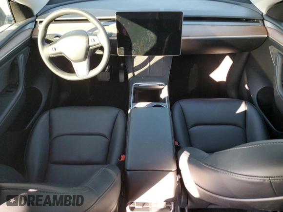 2024 Tesla Model Y with VIN 7SAYGDED7RF108604, listed as a Copart auction lot 48384825 with 24,603 mi miles and Salvage Title. Bid and sale history available at DreamBid. Image 8.