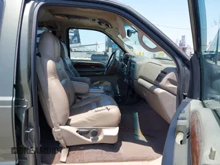 2001 Ford Excursion Limited z VIN 1FMNU42S91EA39377, wystawiony jako IAAI lot #42359734 z przebiegiem 156 168 mil mil oraz . Historia ofert i sprzedaży dostępna na DreamBid. Obrazek 5.
