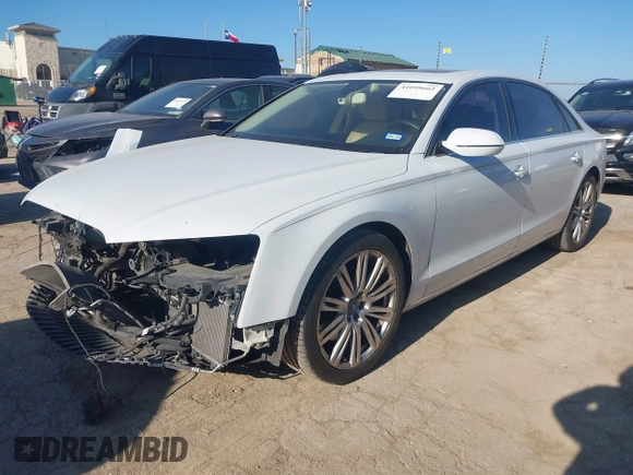2014 Audi A8 3.0T z VIN WAURGAFDXEN006902, wystawiony jako IAAI lot #41099662 z przebiegiem 118 734 mil mil oraz . Historia ofert i sprzedaży dostępna na DreamBid. Obrazek 18.