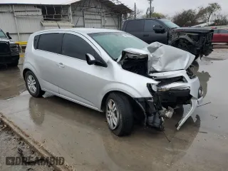 2014 Chevrolet Sonic LT with VIN 1G1JC6SH1E4190045, listed as a Copart auction lot 88254065 with 98,185 mi miles and Salvage Title. Bid and sale history available at carsss.com. Image 4.