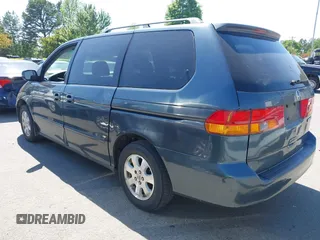 2004 Honda Odyssey EX with VIN 5FNRL18684B027564, listed as a IAAI auction lot 42044126 with 185,627 mi miles and . Bid and sale history available at DreamBid. Image 3.