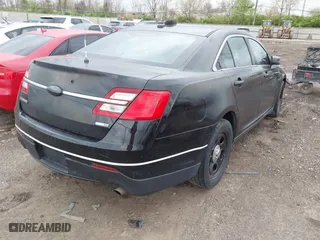 2013 Ford Sedan Police Interceptor with VIN 1FAHP2M89DG162643, listed as a IAAI auction lot 42088765 with 119,386 mi miles. Bid and sale history available at carsss.com. Image 4.