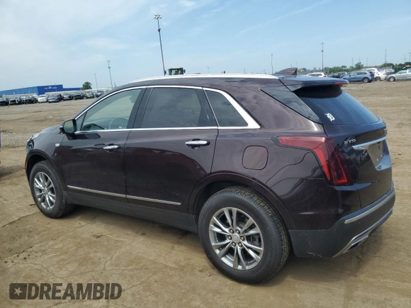 2021 Cadillac XT5 FWD Premium Luxury with VIN 1GYKNCRS9MZ217560, listed as a Copart auction lot 60733295 with 52,242 mi miles and Salvage title. Bid and sale history available at DreamBid. Image 2.