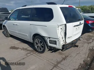2014 Kia Sedona LX with VIN KNDMG4C75E6545483, listed as a IAAI auction lot 42166152 with 121,827 mi miles and . Bid and sale history available at carsss.com. Image 3.