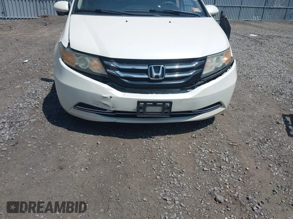 2015 Honda Odyssey EX-L with VIN 5FNRL5H64FB069742, listed as a IAAI auction lot 42101807 with 152,611 mi miles and . Bid and sale history available at DreamBid. Image 6.
