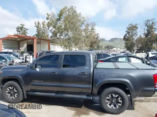 2017 Toyota Tacoma SR5 with VIN 3TMAZ5CN6HM050456, listed as a IAAI auction lot 38968606 with 48,576 mi miles and . Bid and sale history available at DreamBid. Image 15.