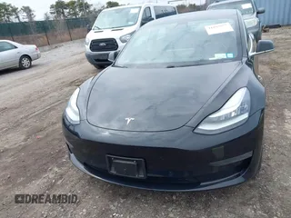 2019 Tesla Model 3 Mid Range with VIN 5YJ3E1EA2KF395549, listed as a IAAI auction lot 41895977 with 97,108 mi miles and . Bid and sale history available at carsss.com. Image 12.