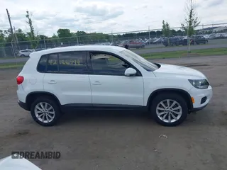 2014 Volkswagen Tiguan S with VIN WVGBV3AX0EW589381, listed as a IAAI auction lot 42186999 with 144,137 mi miles and . Bid and sale history available at DreamBid. Image 13.
