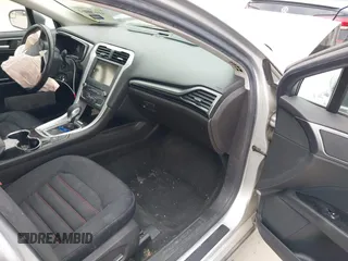 2016 Ford Fusion SE Hybrid with VIN 3FA6P0LU2GR340755, listed as a IAAI auction lot 41673932 with 191,650 mi miles. Bid and sale history available at carsss.com. Image 5.