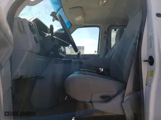 2014 Ford Econoline Wagon XL with VIN 1FBNE3BL2EDA82379, listed as a Copart auction lot 61391474 with 77,151 mi miles and Salvage Title. Bid and sale history available at carsss.com. Image 7.
