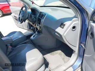 2005 Hyundai Tucson GLS with VIN KM8JN72D15U191616, listed as a IAAI auction lot 42081034 with 217,168 mi miles. Bid and sale history available at carsss.com. Image 5.