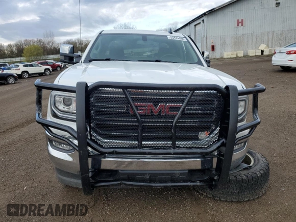 2019 GMC Sierra 1500 SLE z VIN 2GTV2MEC0K1170652, wystawiony jako Copart lot #53474495 z przebiegiem 58 181 mil mil oraz Czysty tytuł • Clean title. Historia ofert i sprzedaży dostępna na DreamBid. Obrazek 5.