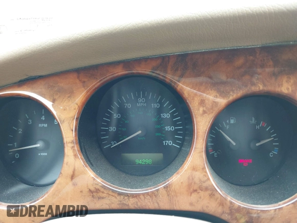 1997 Jaguar XK with VIN SAJGX274XVC017622, listed as a IAAI auction lot 41614339 with 94,298 mi miles and . Bid and sale history available at DreamBid. Image 7.