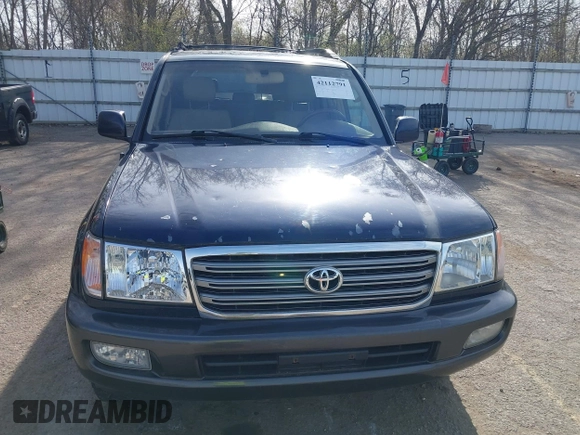 2004 Toyota Land Cruiser with VIN JTEHT05J942054673, listed as a IAAI auction lot 42112791 with 206,784 mi miles. Bid and sale history available at carsss.com. Image 12.