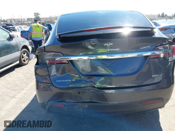2018 Tesla Model X 75D with VIN 5YJXCBE26JF121937, listed as a IAAI auction lot 41652666 with 93,478 mi miles and . Bid and sale history available at carsss.com. Image 16.
