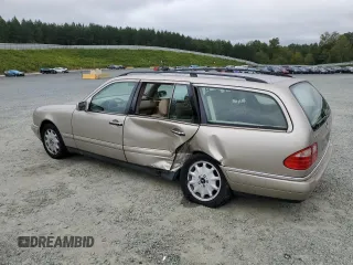 1999 Mercedes-Benz E-Class with VIN WDBJH65F9XA880146, listed as a Copart auction lot 72306164 with 192,442 mi miles and Salvage Title. Bid and sale history available at carsss.com. Image 2.