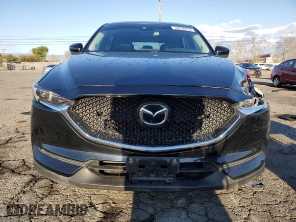 2020 Mazda CX-5 Grand Touring with VIN JM3KFADM0L0786565, listed as a Copart auction lot 48430915 with 60,390 mi miles and Salvage Title. Bid and sale history available at carsss.com. Image 5.