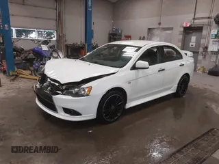 2014 Mitsubishi Lancer GT with VIN JA32U8FWXEU016230, listed as a IAAI auction lot 41379899 with 108,511 mi miles. Bid and sale history available at carsss.com. Image 19.
