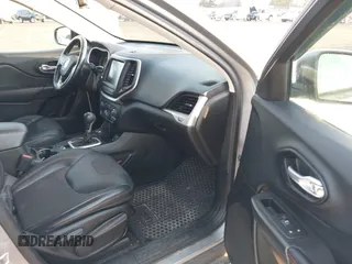 2015 Jeep Cherokee Trailhawk z VIN 1C4PJMBS2FW728961, wystawiony jako IAAI lot #40712830 z przebiegiem 79 299 mil mil oraz . Historia ofert i sprzedaży dostępna na DreamBid. Obrazek 5.