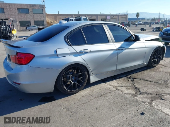 2015 BMW 3 Series 328i with VIN WBA3A5C57FF609054, listed as a IAAI auction lot 41330498 with 129,378 mi miles. Bid and sale history available at carsss.com. Image 4.