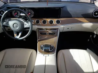 2018 Mercedes-Benz E 300 with VIN WDDZF4KBXJA464197, listed as a Copart auction lot 53205215 with 38,002 mi miles and Salvage title. Bid and sale history available at DreamBid. Image 8.