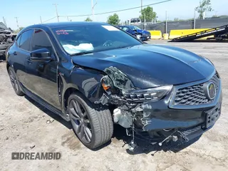 2019 Acura TLX w/A-Spec Pkg z VIN 19UUB2F68KA003584, wystawiony jako IAAI lot #42266311 z przebiegiem 61 485 mil mil oraz . Historia ofert i sprzedaży dostępna na DreamBid. Obrazek 1.