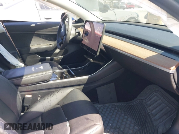 2020 Tesla Model 3 Standard Range Plus with VIN 5YJ3E1EA1LF590396, listed as a IAAI auction lot 41868089 with 51,278 mi miles. Bid and sale history available at carsss.com. Image 5.