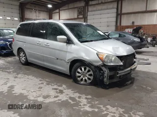 2010 Honda Odyssey EX z VIN 5FNRL3H44AB085662, wystawiony jako IAAI lot #42199416 z przebiegiem 181 221 mil mil oraz . Historia ofert i sprzedaży dostępna na DreamBid. Obrazek 1.