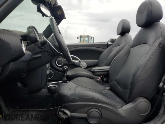 2012 MINI Convertible with VIN WMWZN3C50CT134069, listed as a Copart auction lot 56524155 with 106,480 mi miles and Clean title. Bid and sale history available at DreamBid. Image 7.
